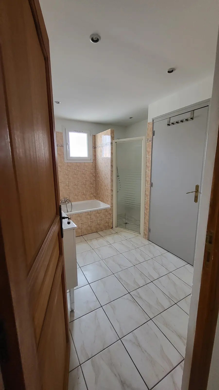 A bathroom with a bath